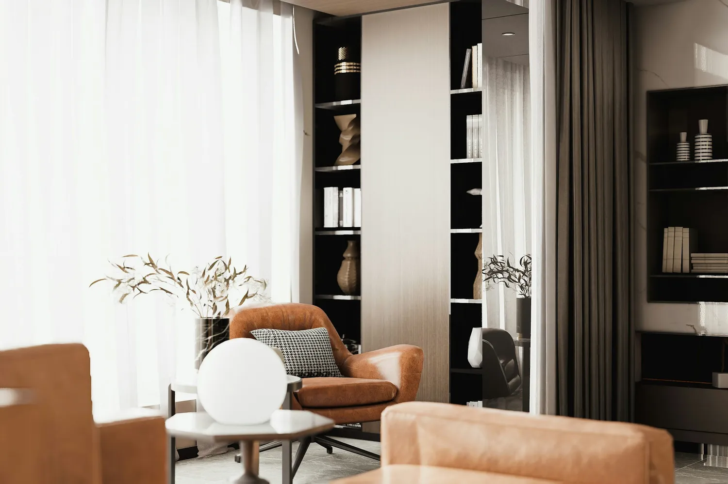 Therapy room with two armchairs, a round lamp and a bookcase